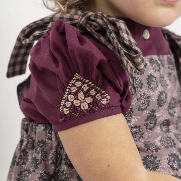 Camisa mangas nido de abeja rosa vino.