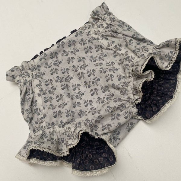 Pololo reversible estampado floral azul plomo